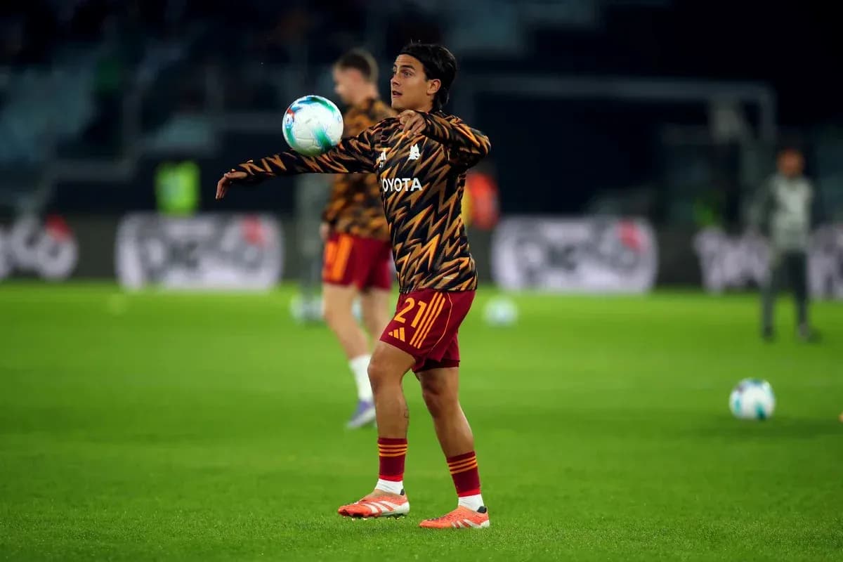 Player warming up and juggling ball during training Player warming up and juggling ball during training