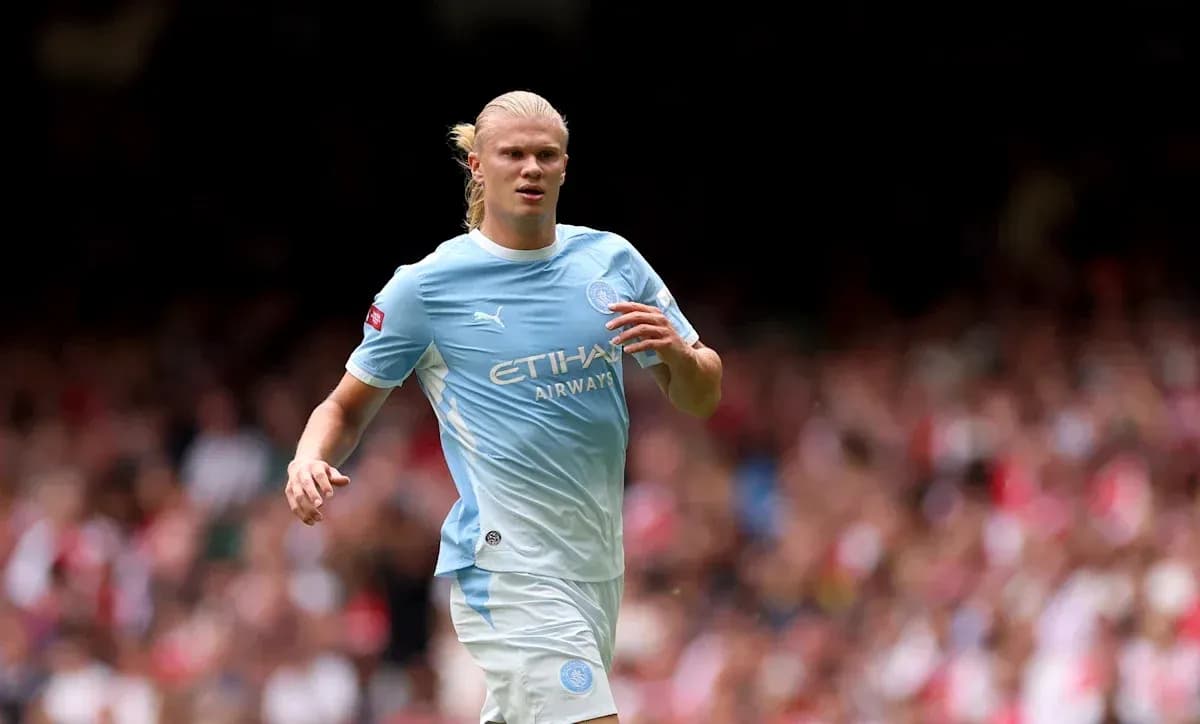 Player in light blue jersey running on the field Player in light blue jersey running on the field