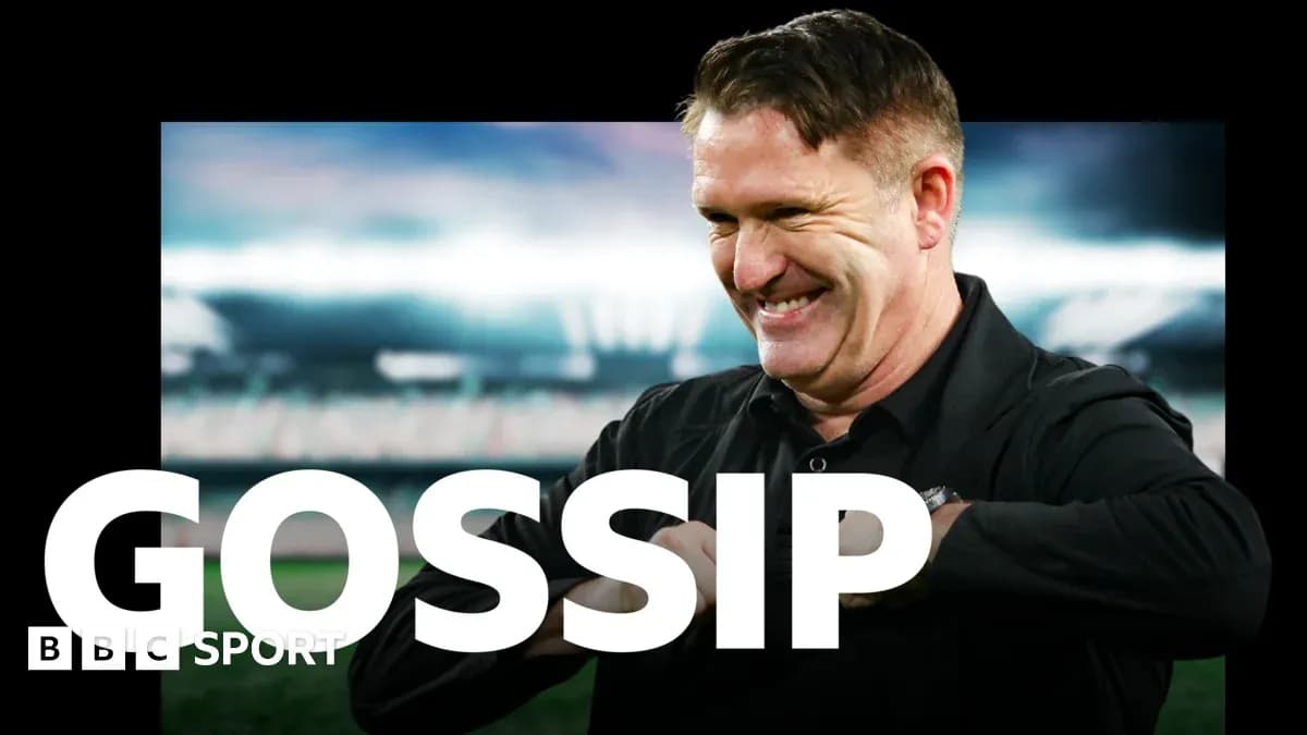 Coach smiling with stadium background during segment Coach smiling with stadium background during segment