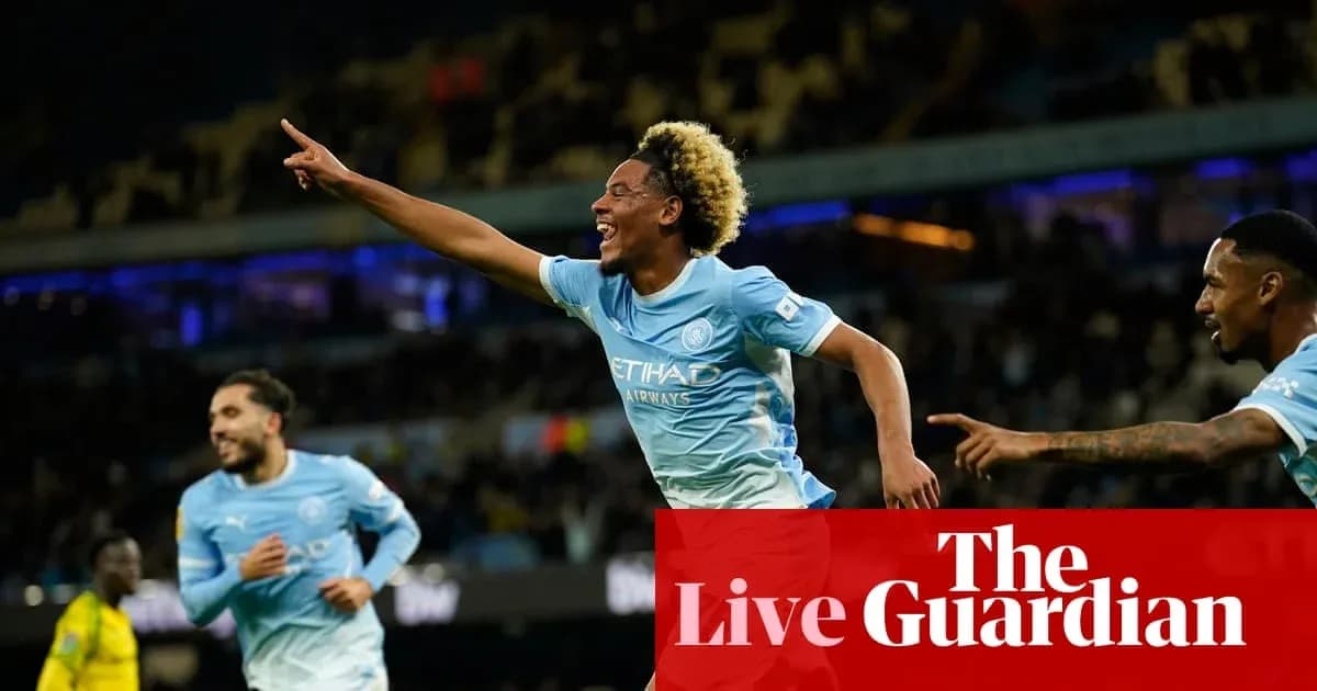 Player celebrating goal with teammates at stadium Player celebrating goal with teammates at stadium