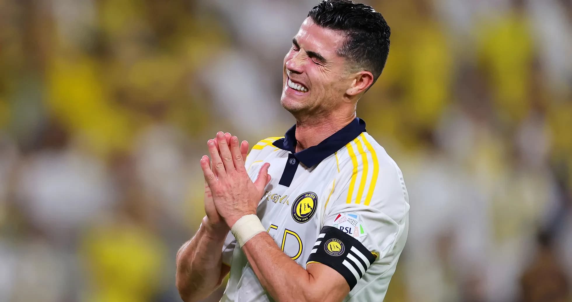 Player celebrating on the field after match Player celebrating on the field after match