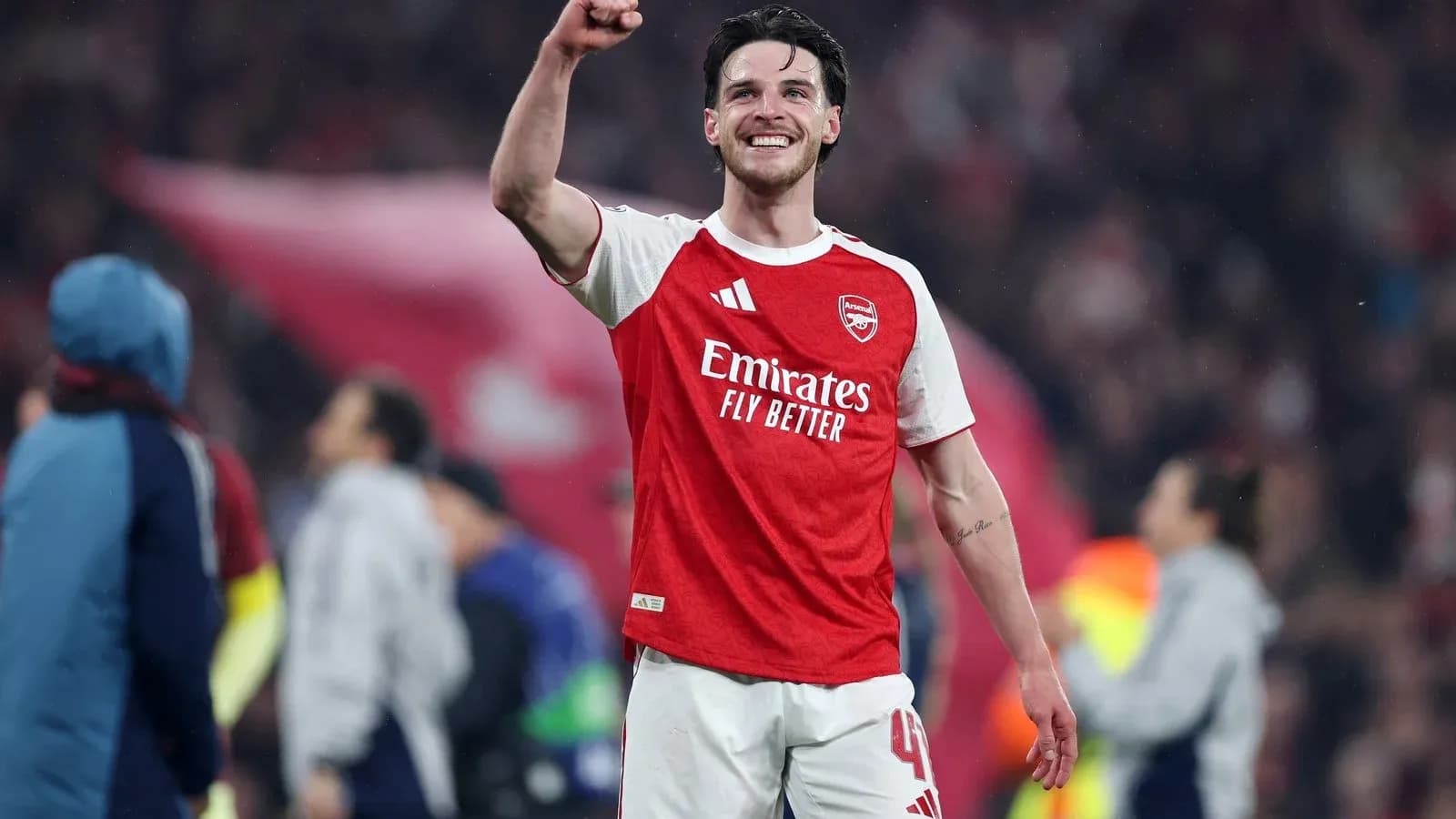 Player celebrating with raised fist after match Player celebrating with raised fist after match