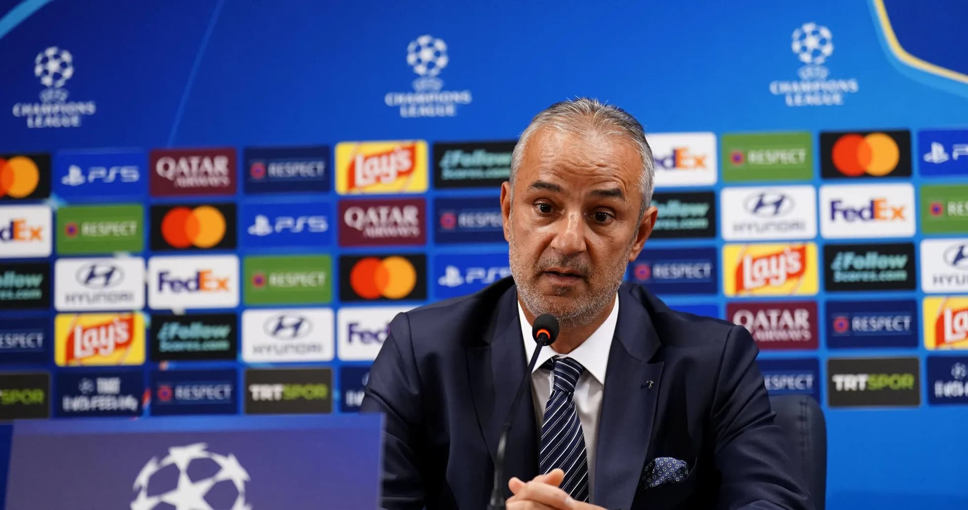 Coach speaking at UEFA Champions League press conference Coach speaking at UEFA Champions League press conference