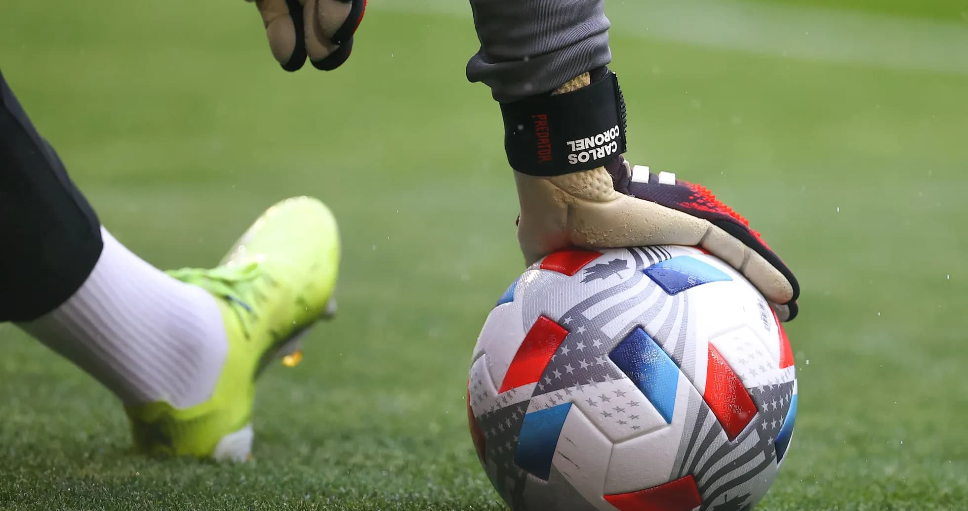 Goalkeeper placing ball on field before kick Goalkeeper placing ball on field before kick