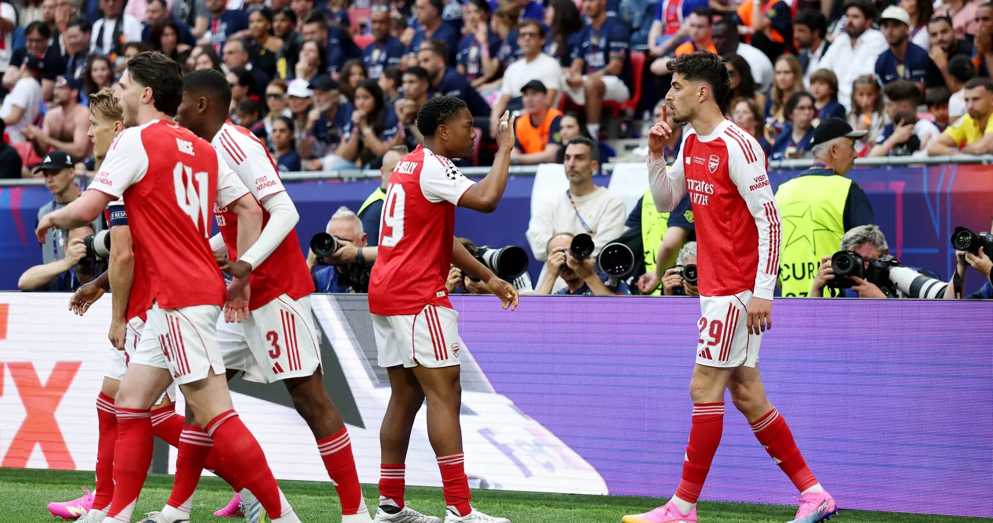 Arsenal players celebrating a goal during match Arsenal players celebrating a goal during match