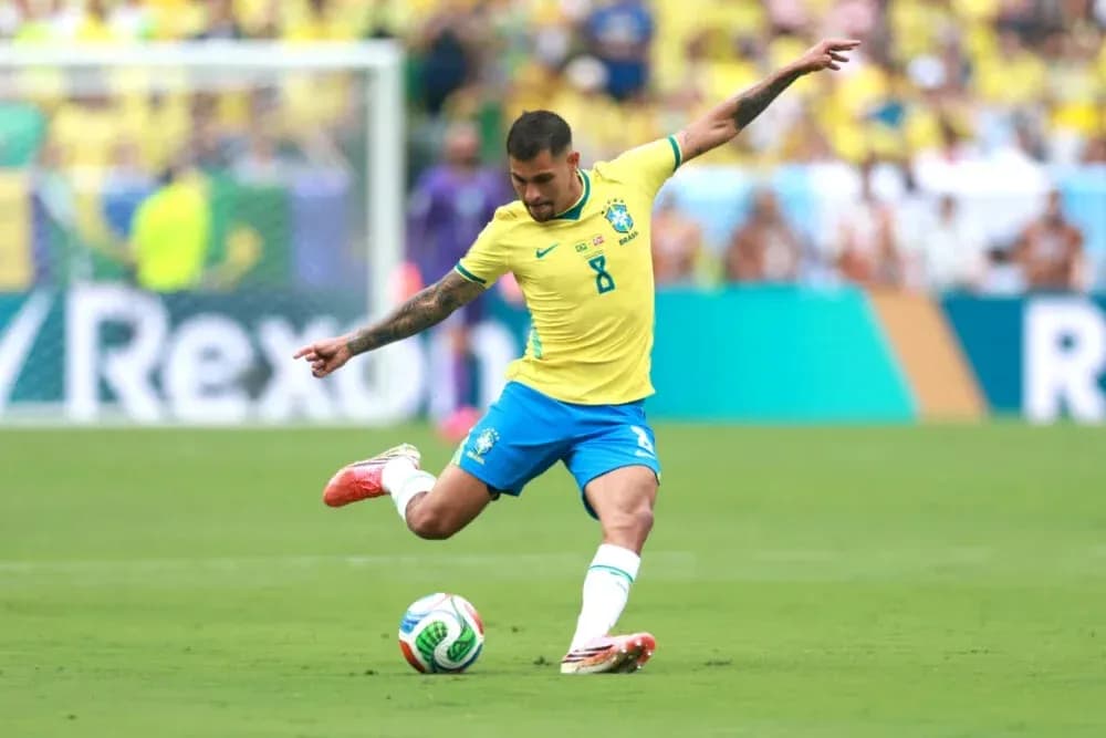 Player kicking soccer ball during match for Brazil Player kicking soccer ball during match for Brazil