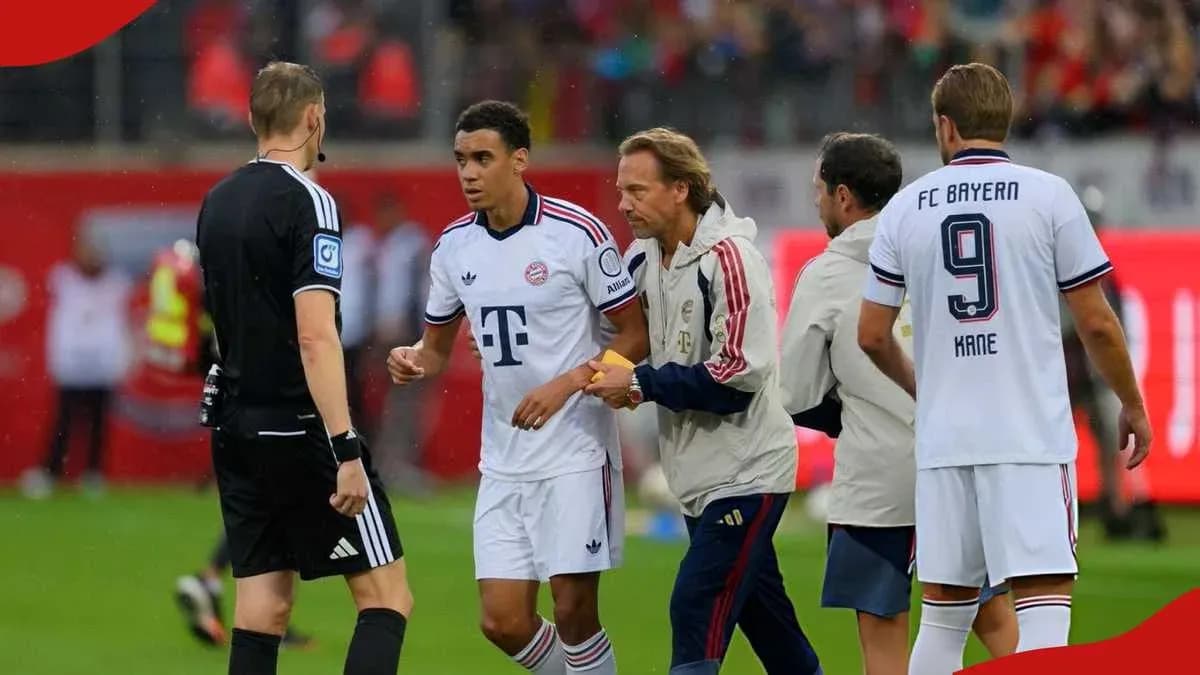 Bayern Munich players interacting with the referee during match Bayern Munich players interacting with the referee during match