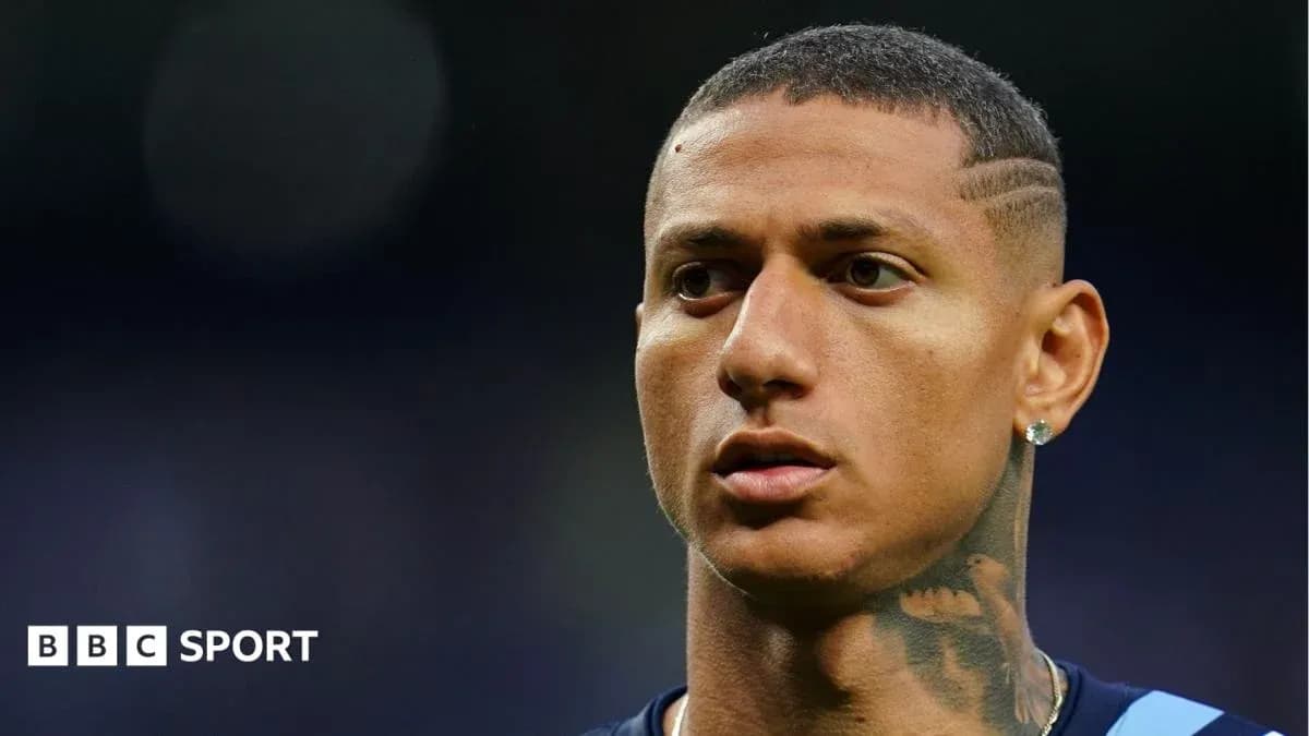 Close-up of player with short hair and tattoos Close-up of player with short hair and tattoos