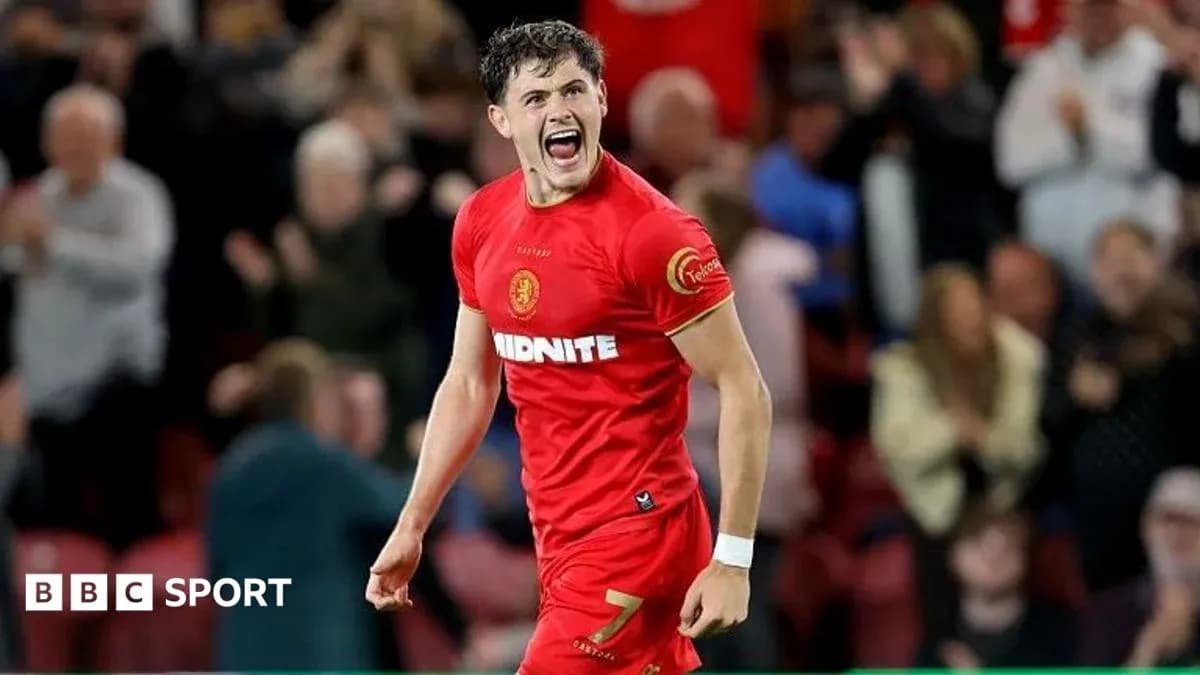 Player celebrating after scoring a goal Player celebrating after scoring a goal