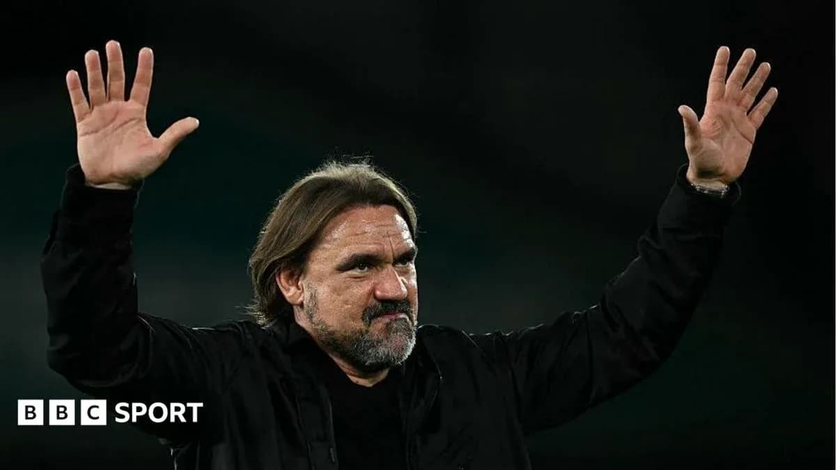 Coach waving to fans after match conclusion Coach waving to fans after match conclusion