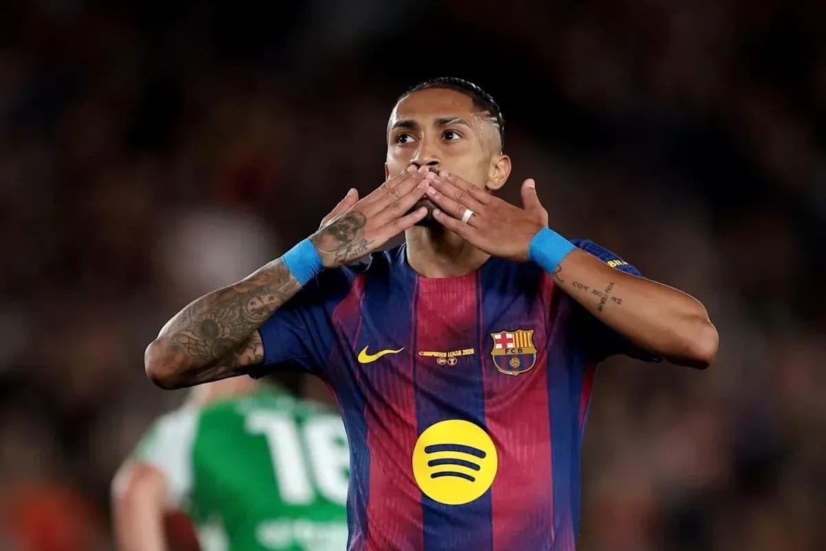 Player celebrating with hand gestures on the field Player celebrating with hand gestures on the field