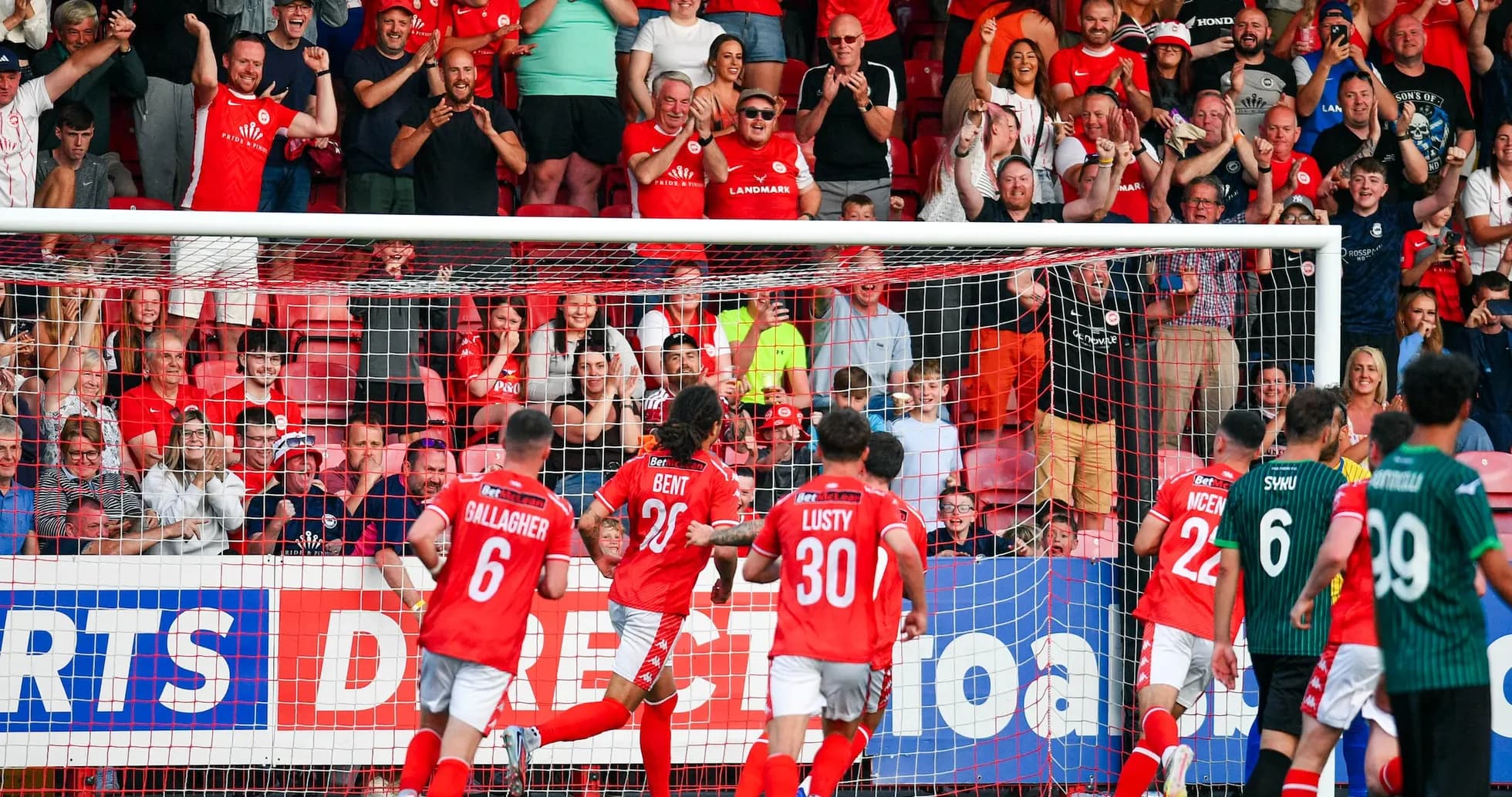 Larne players celebrating a goal against FK Crvena Zvezda Larne players celebrating a goal against FK Crvena Zvezda