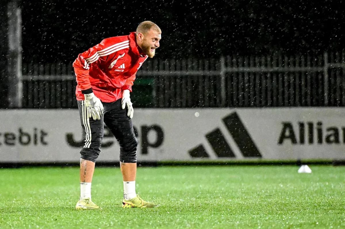 Goalkeeper training in the rain at practice Goalkeeper training in the rain at practice