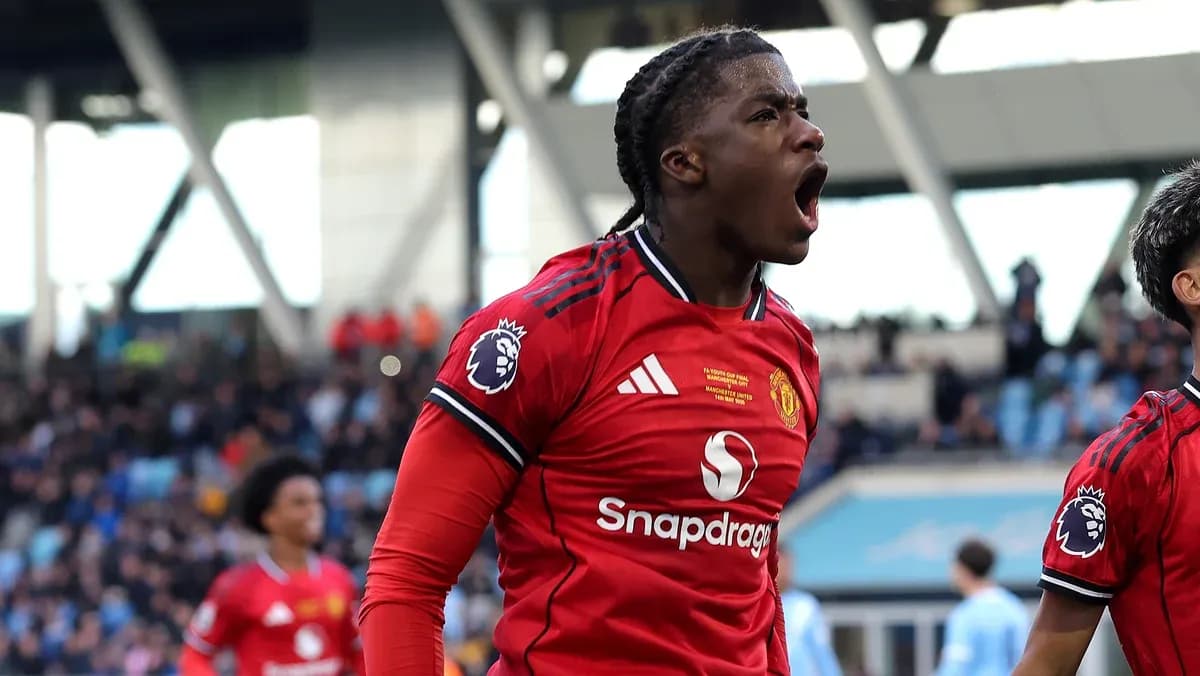 Player celebrating a goal in Manchester United kit Player celebrating a goal in Manchester United kit