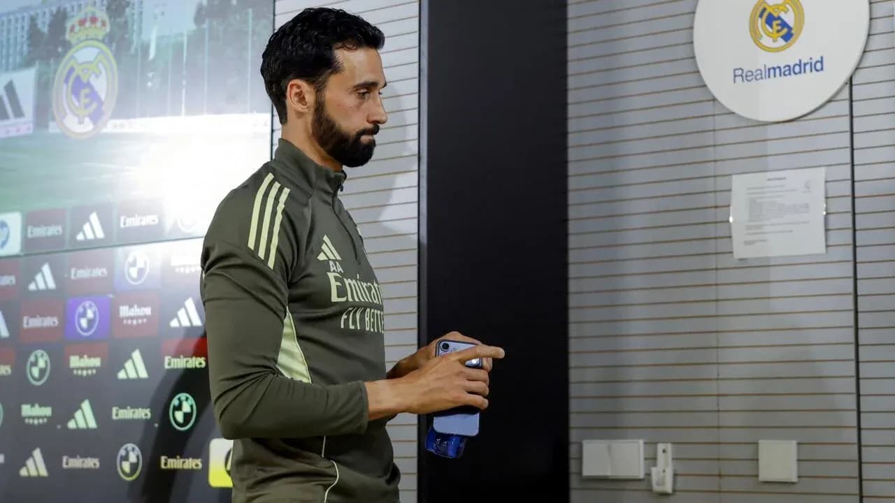 Player entering press room at Real Madrid facility Player entering press room at Real Madrid facility