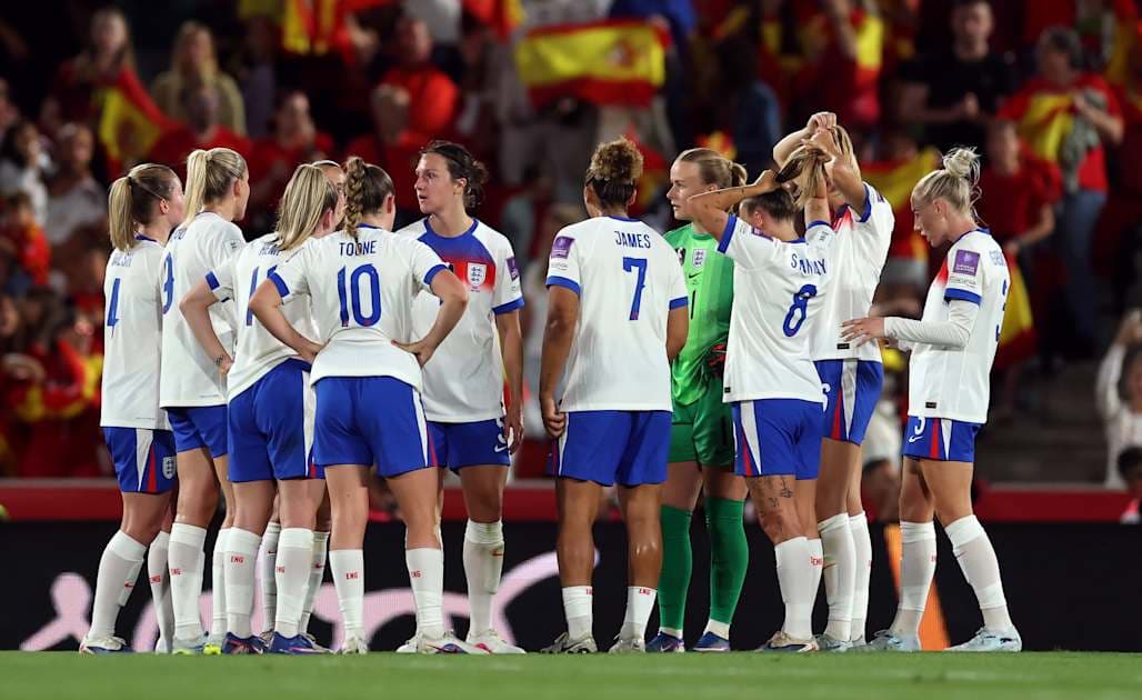England women's team huddled during match preparation England women's team huddled during match preparation