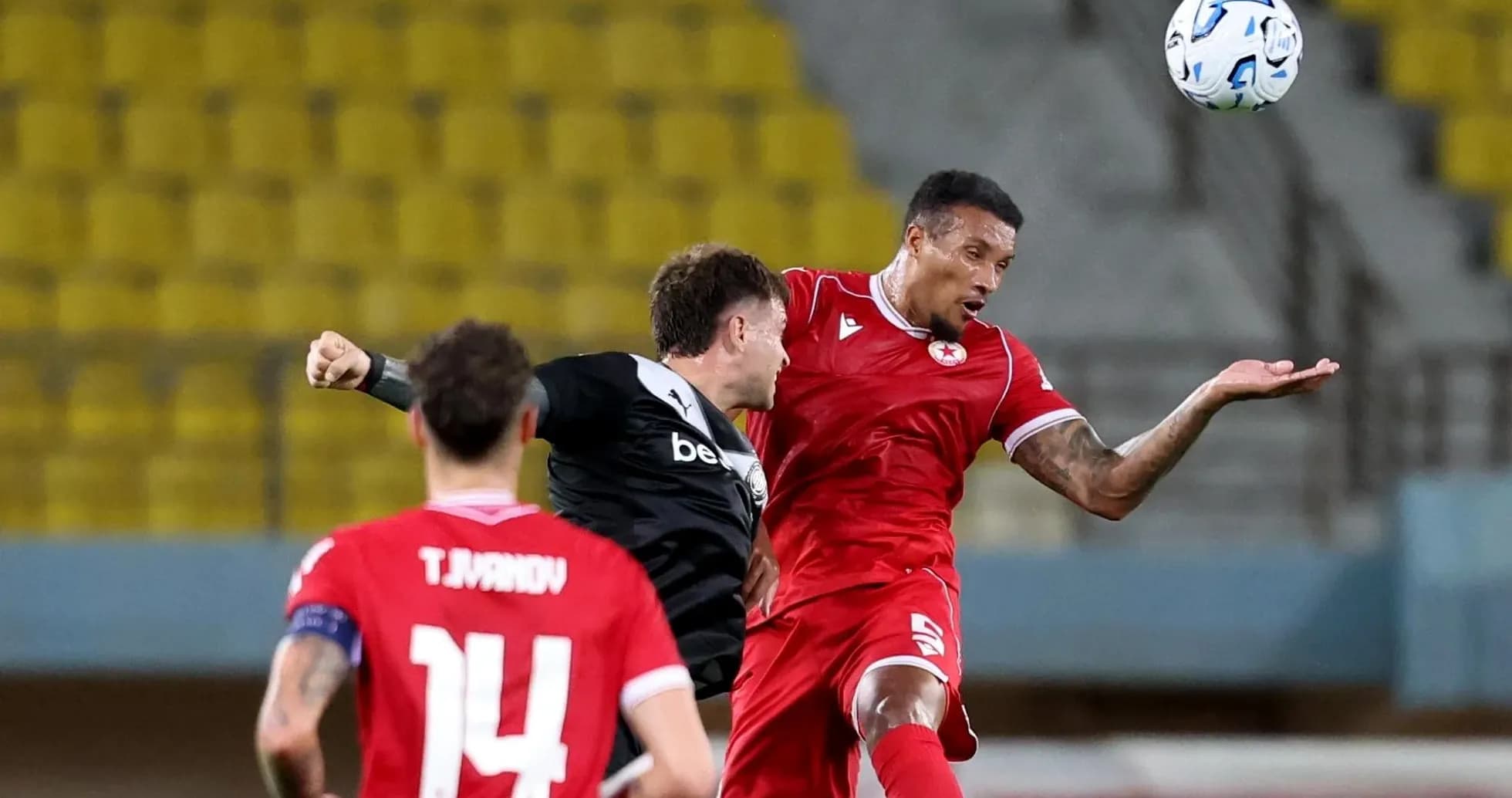 CSKA Sofia player contesting a header during match CSKA Sofia player contesting a header during match