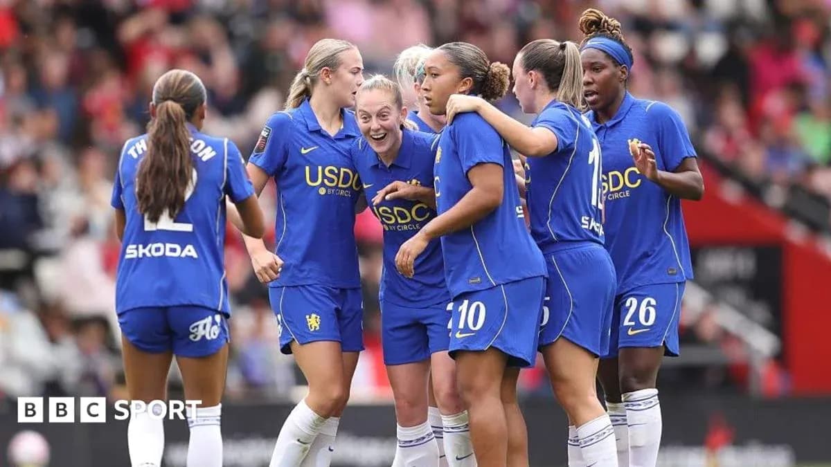 Chelsea women's team celebrating a goal together Chelsea women's team celebrating a goal together