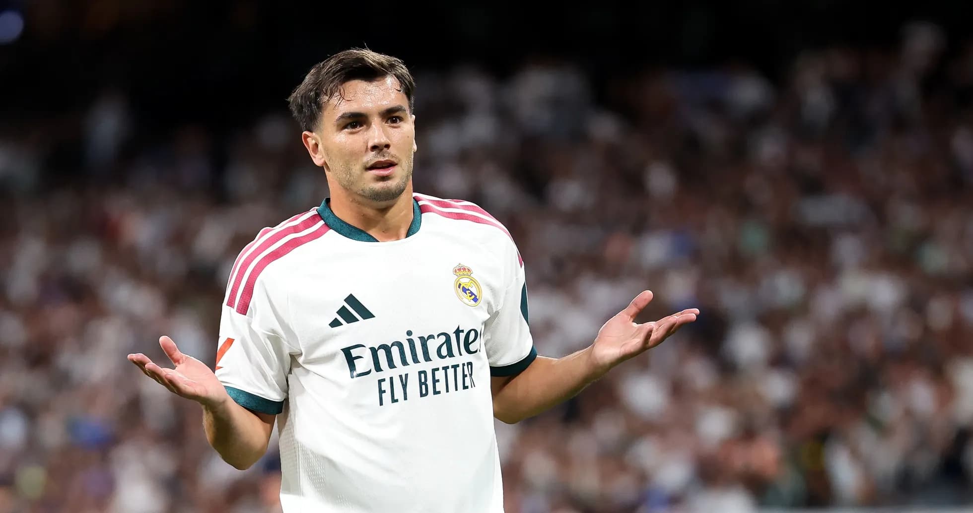 Player gesturing during a match on the field Player gesturing during a match on the field