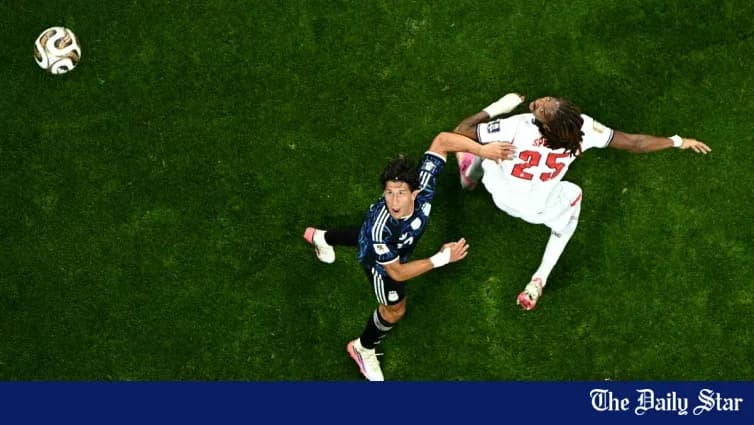 Player tackling opponent during soccer match Player tackling opponent during soccer match