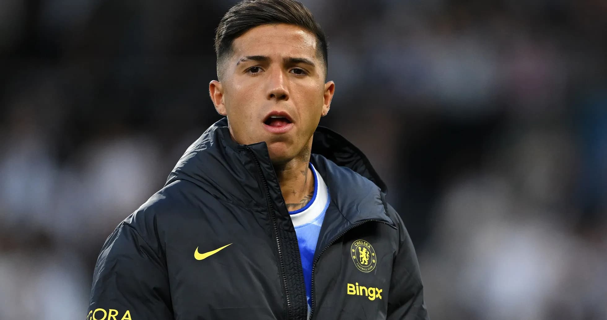 Player in Chelsea jacket on the sidelines Player in Chelsea jacket on the sidelines