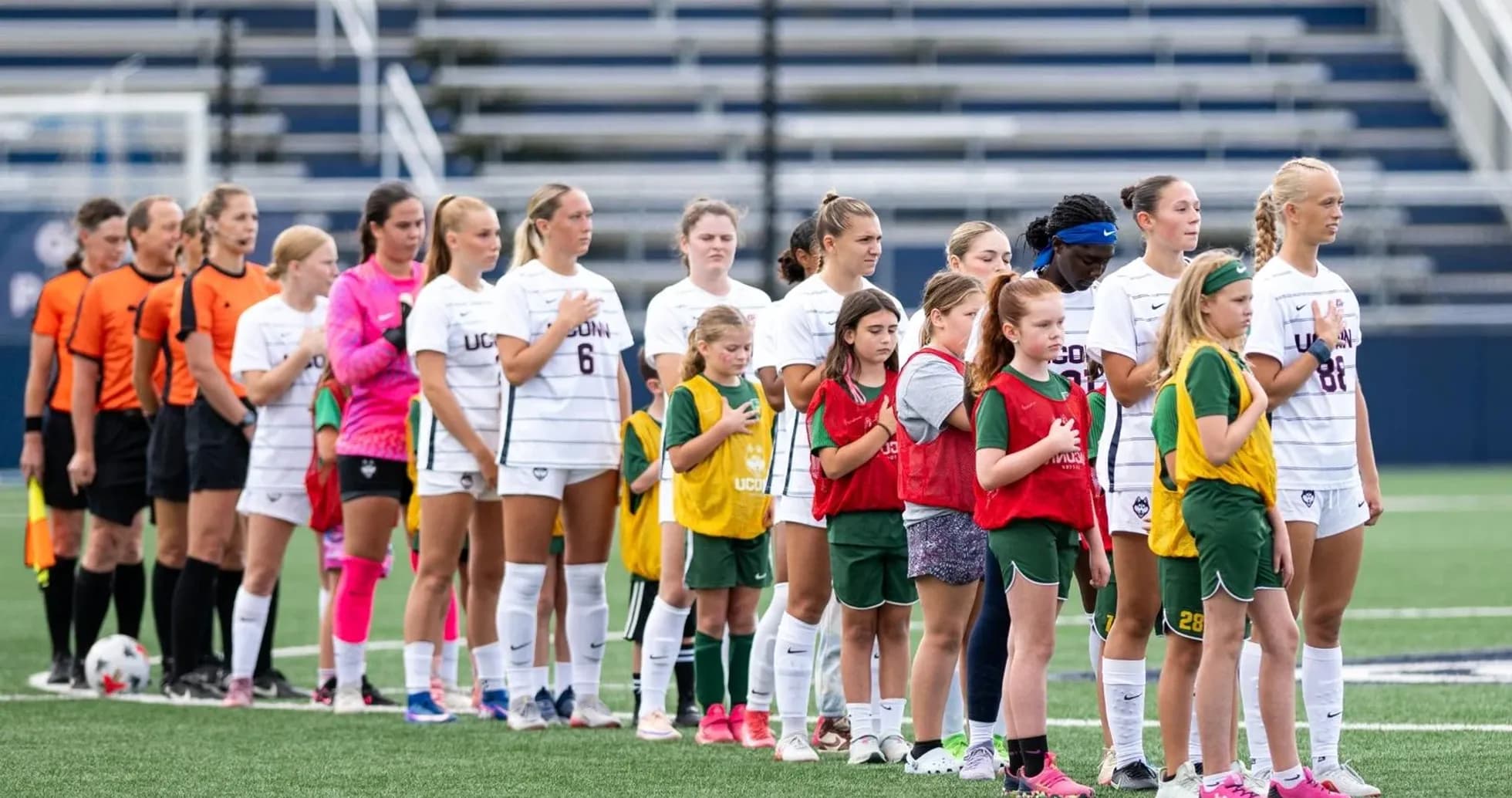 UConn women's soccer team lined up before match UConn women's soccer team lined up before match