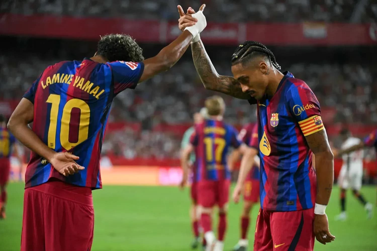 Players celebrating during Sevilla vs Barcelona match Players celebrating during Sevilla vs Barcelona match