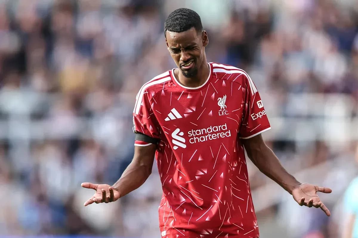 Liverpool player expressing frustration on the pitch Liverpool player expressing frustration on the pitch