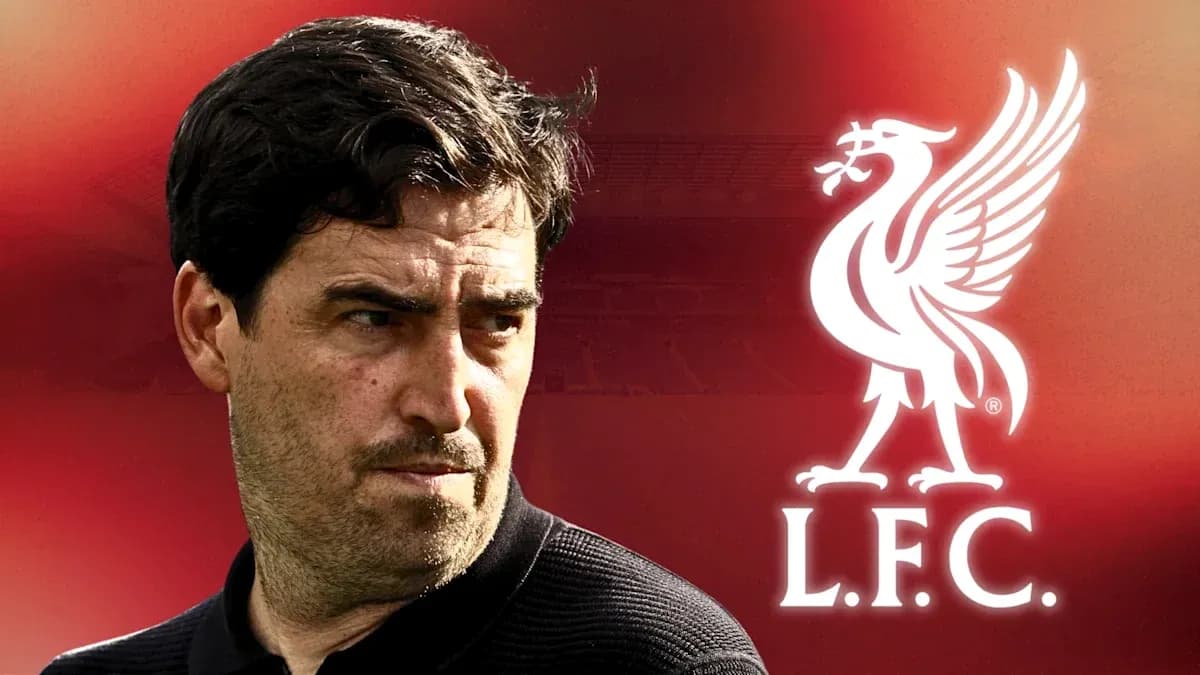 Coach with Liverpool logo in background Coach with Liverpool logo in background