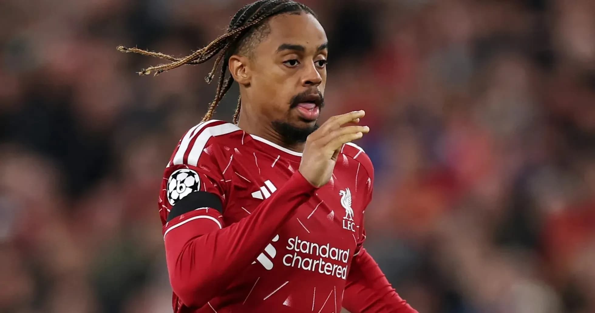 Liverpool player running on the pitch during match Liverpool player running on the pitch during match