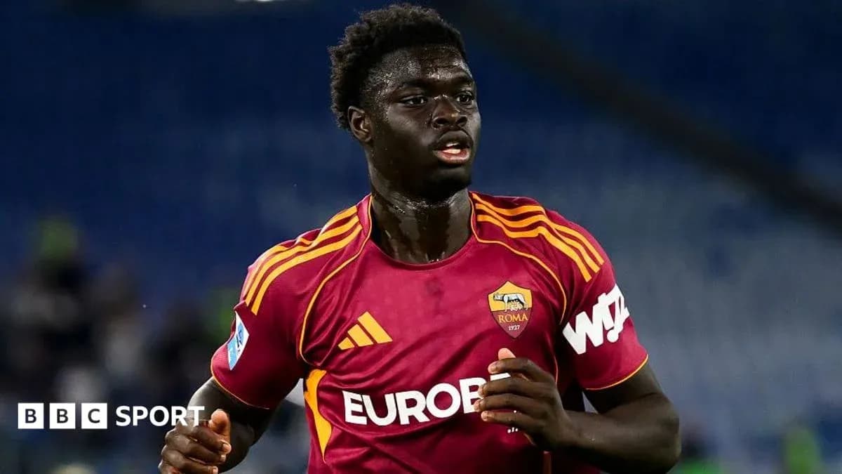 Player in AS Roma kit running during match Player in AS Roma kit running during match