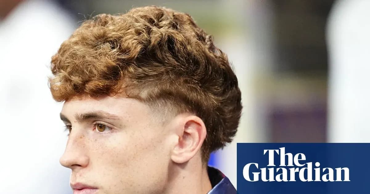 Person with curly hair looking to the side Person with curly hair looking to the side