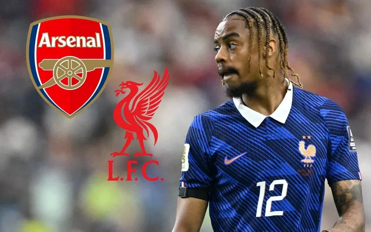 Player in France kit with club logos of Arsenal and Liverpool Player in France kit with club logos of Arsenal and Liverpool