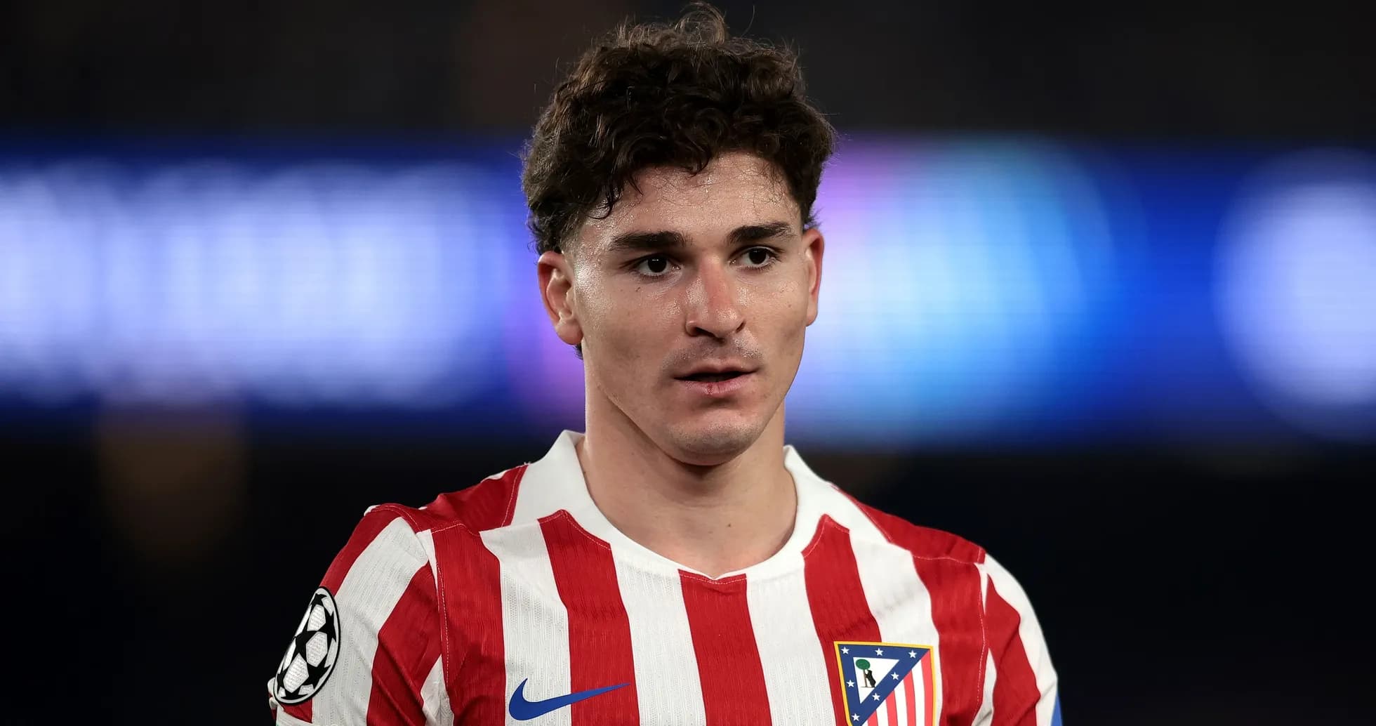 Athletic player in red and white striped jersey Athletic player in red and white striped jersey