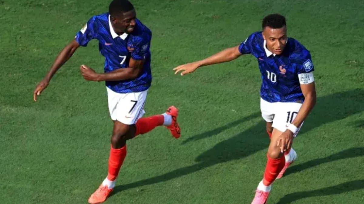 Two players celebrating a goal during a match Two players celebrating a goal during a match