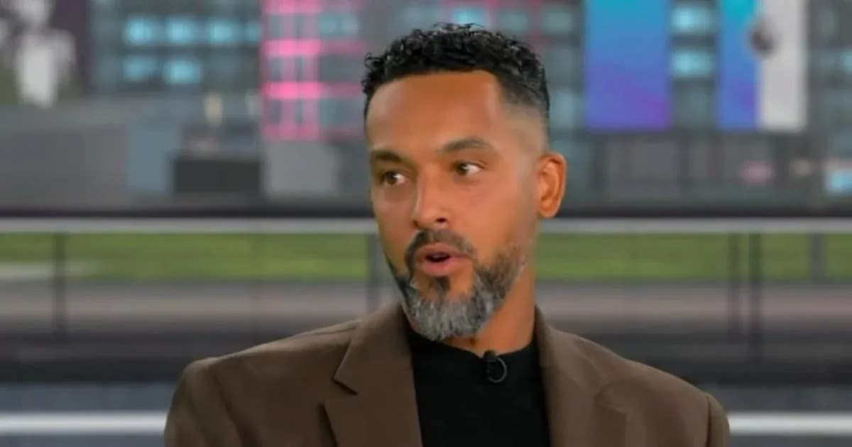 Man speaking during a sports discussion on set Man speaking during a sports discussion on set
