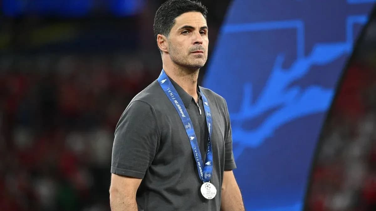 Coach wearing a silver medal at final event Coach wearing a silver medal at final event