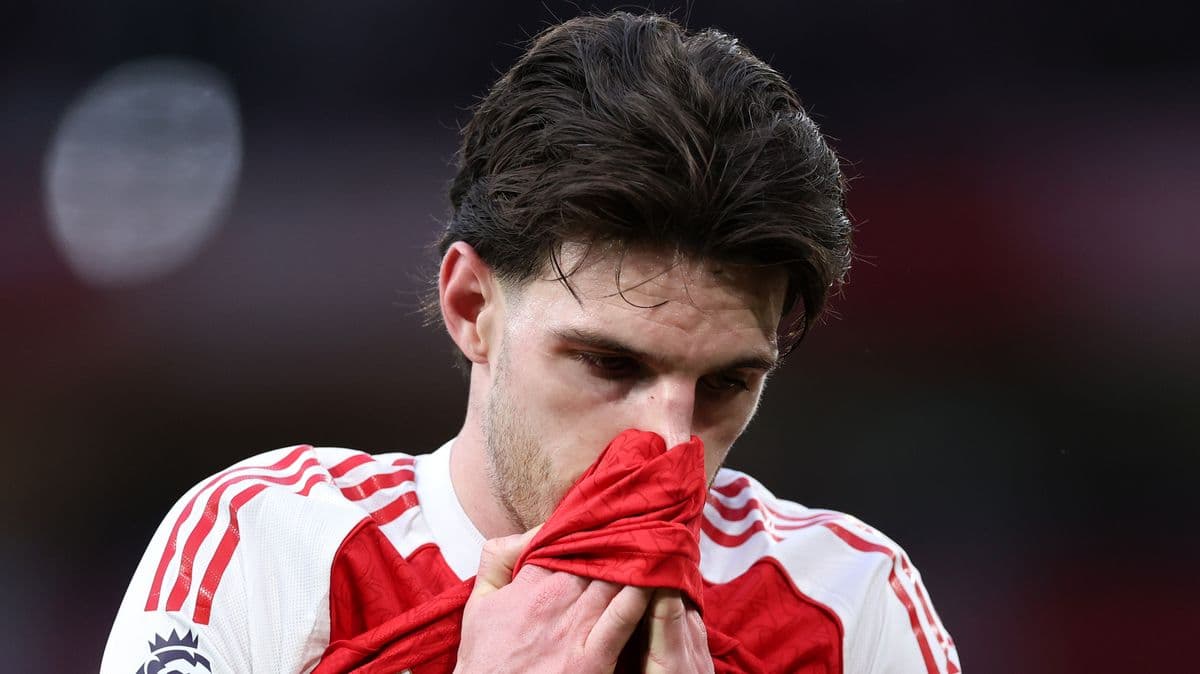 Player holding jersey to face after match Player holding jersey to face after match