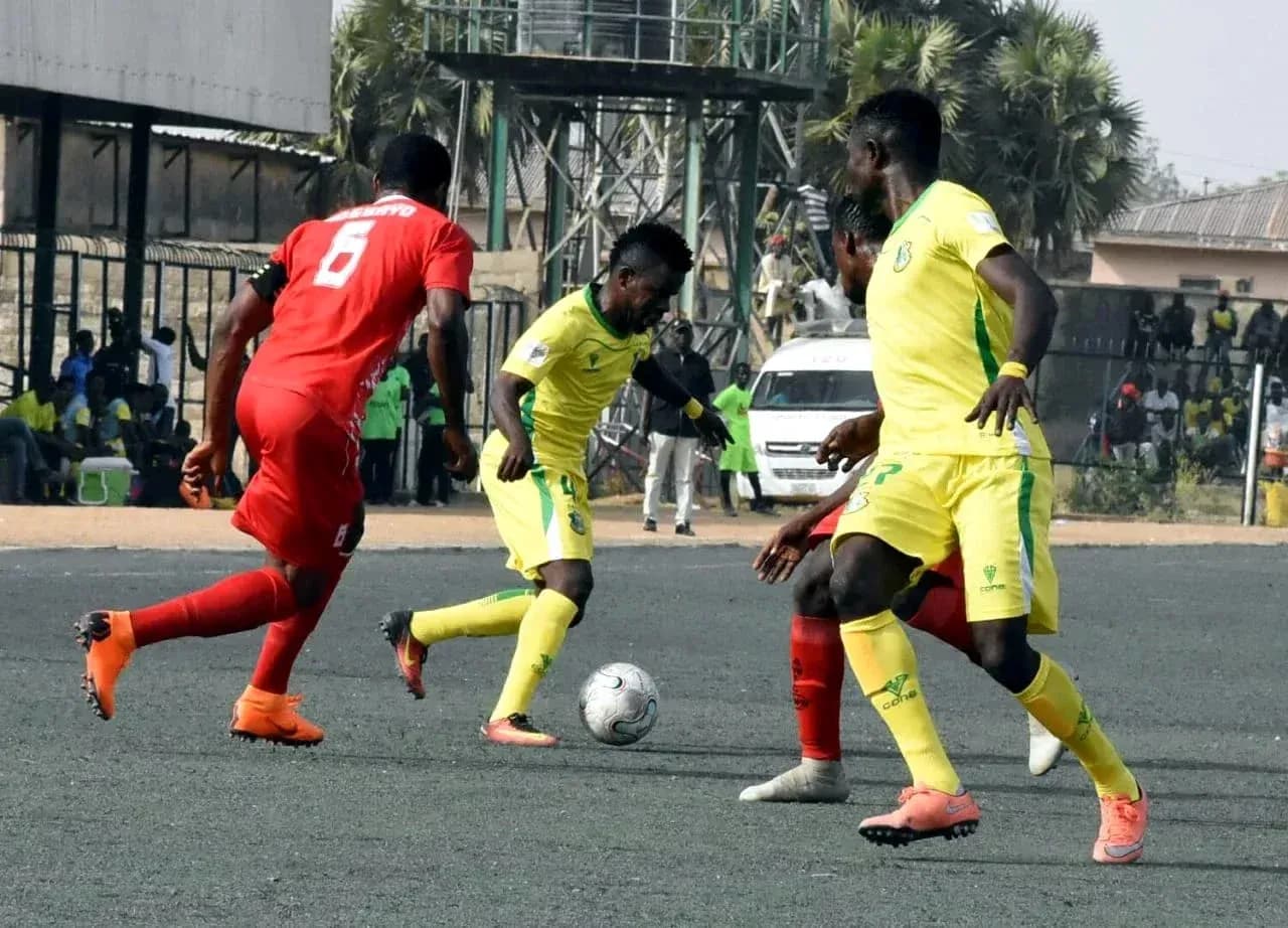 Players competing for the ball in NPFL match Players competing for the ball in NPFL match