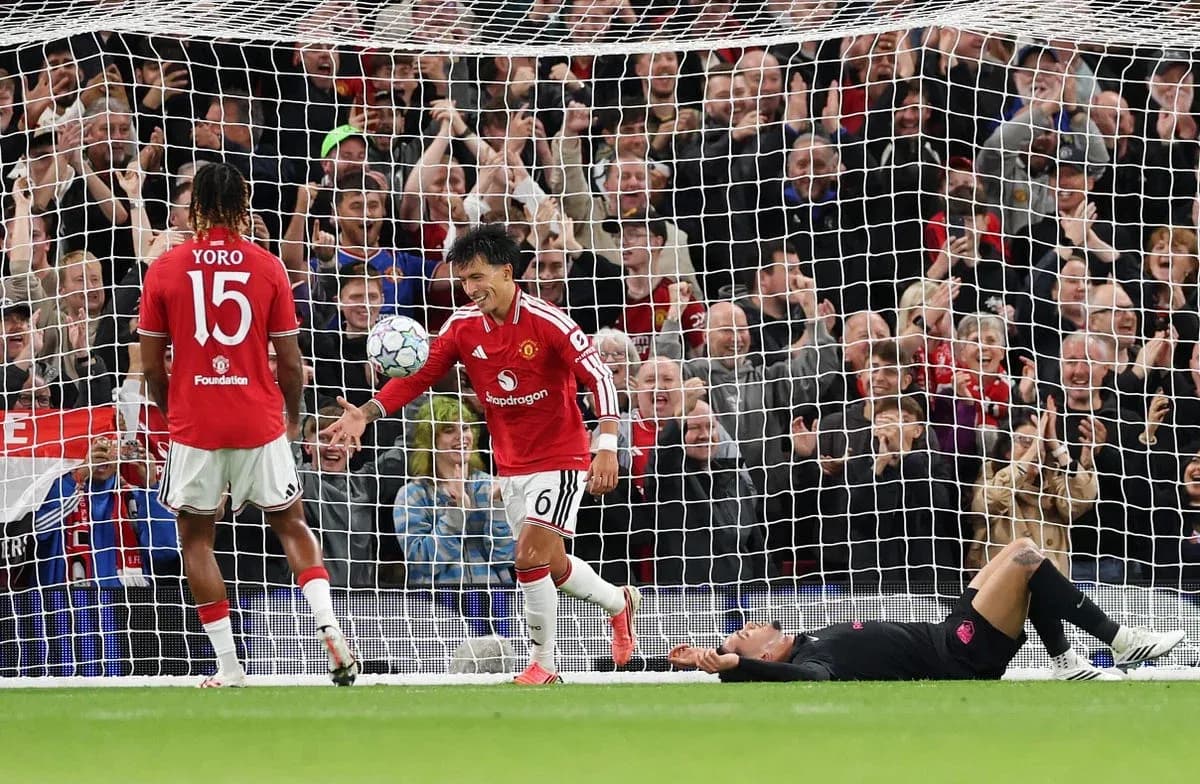 Manchester United player celebrating a goal in match Manchester United player celebrating a goal in match