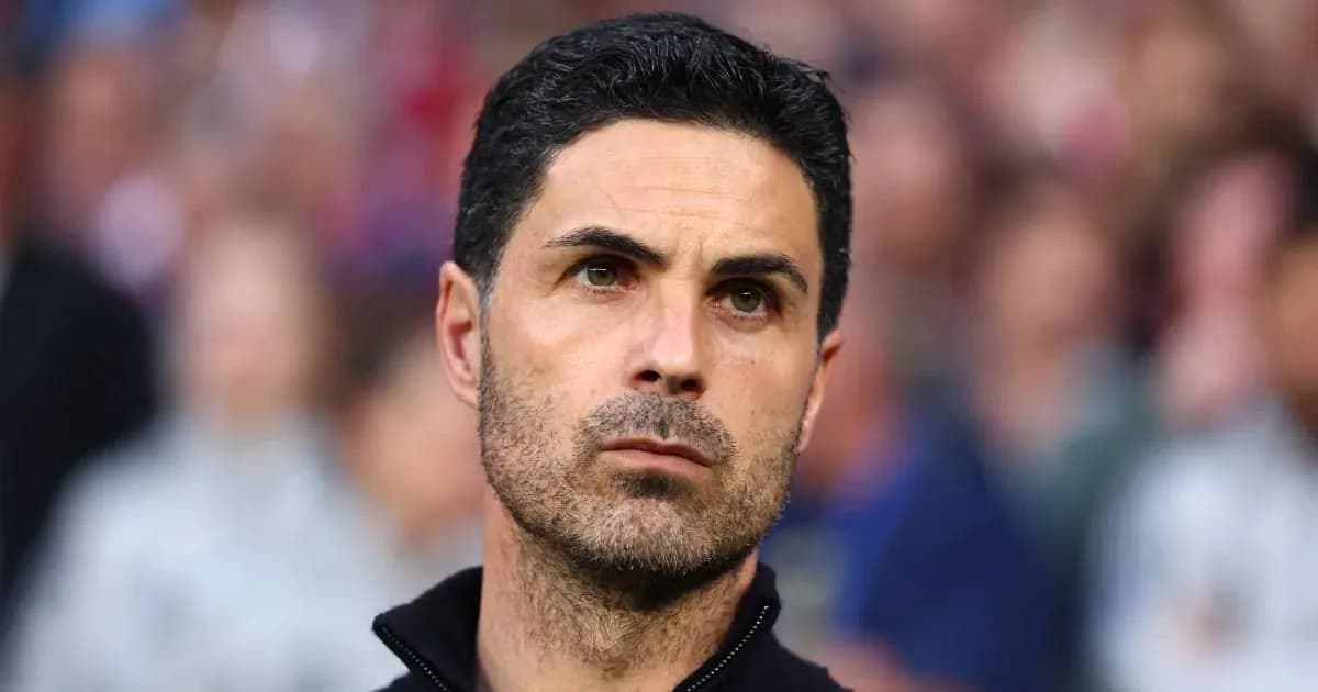 Manager focused during match on sidelines Manager focused during match on sidelines