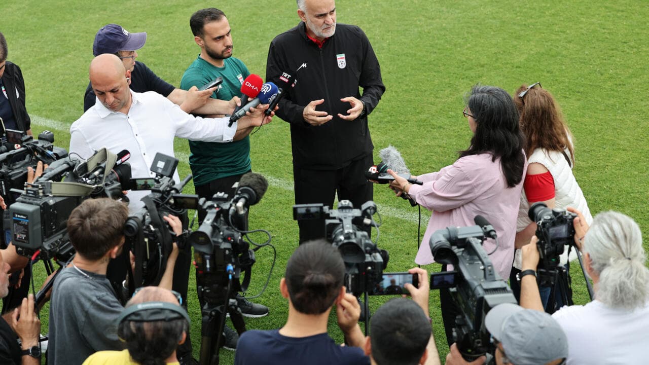 Coach speaking to media during press conference Coach speaking to media during press conference