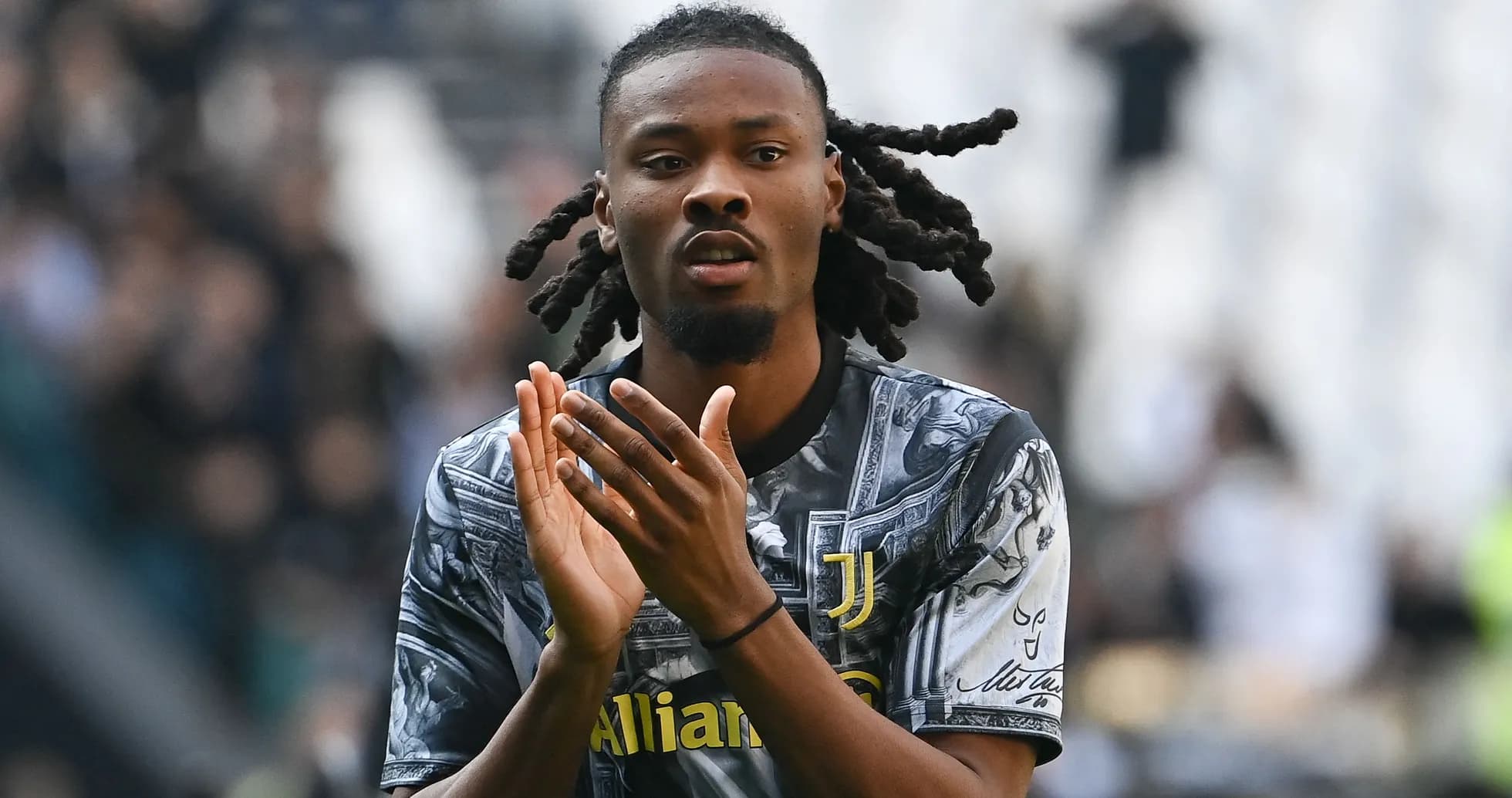 Player applauding fans in Juventus kit Player applauding fans in Juventus kit