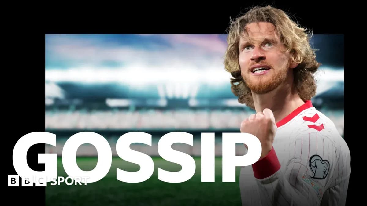 Player celebrating in stadium with raised fist Player celebrating in stadium with raised fist