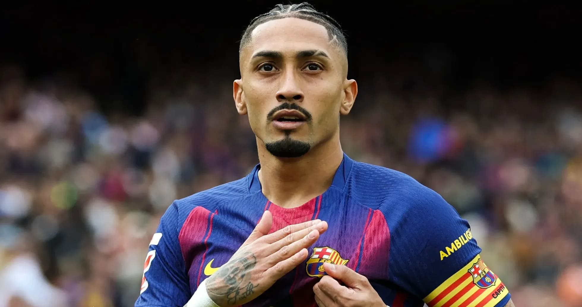 Player touching Barcelona badge on jersey Player touching Barcelona badge on jersey