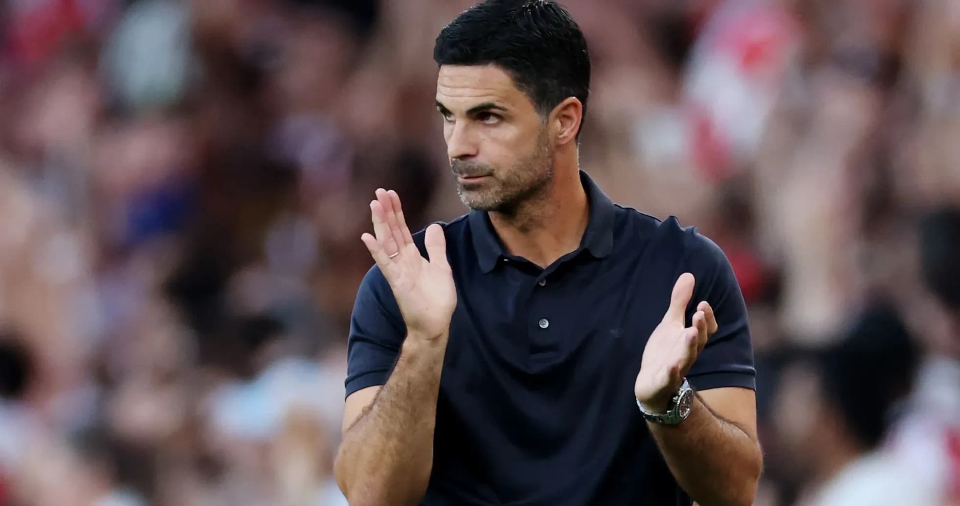 Manager applauding during a football match Manager applauding during a football match