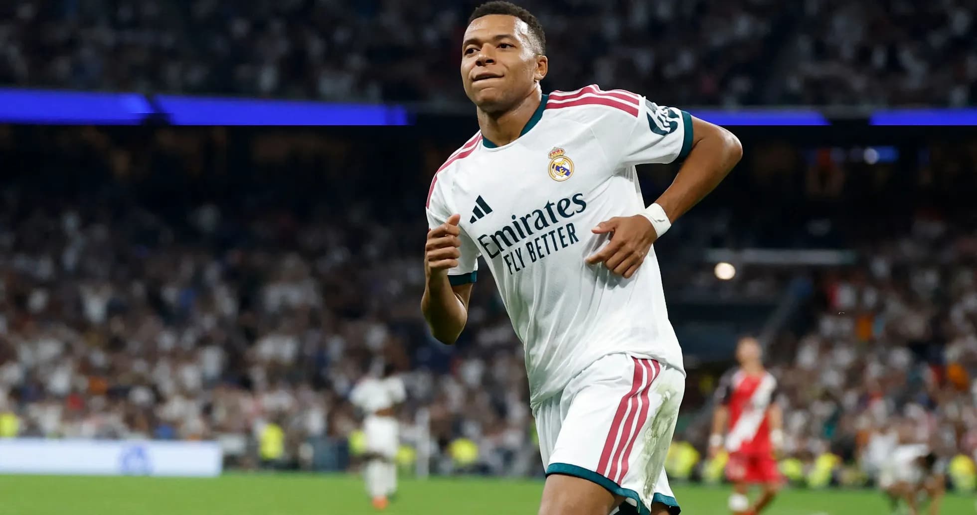 Player running on field during a match Player running on field during a match