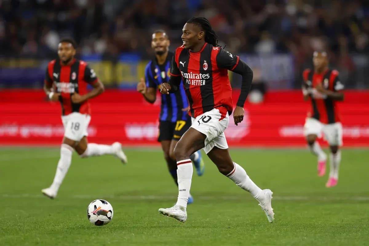 AC Milan player dribbling past opponents during match AC Milan player dribbling past opponents during match