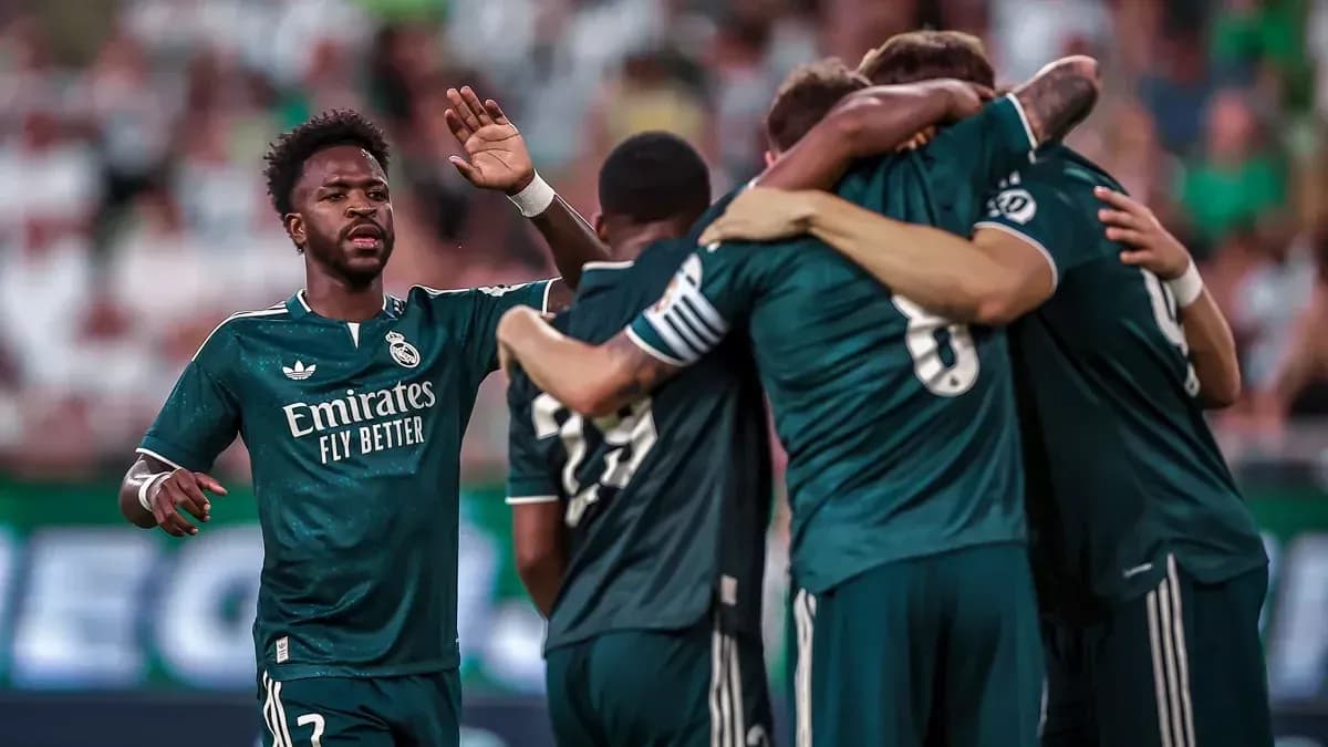 Real Madrid players celebrating a goal during match Real Madrid players celebrating a goal during match