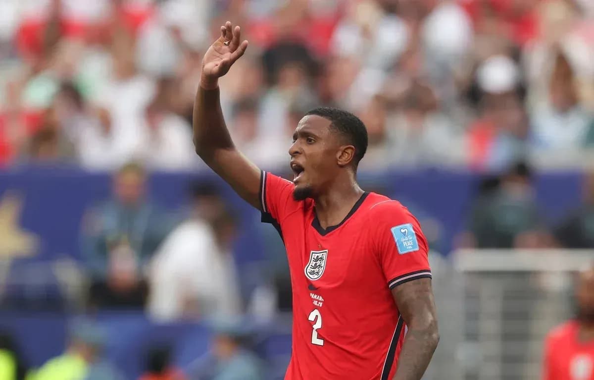 Player in red jersey signaling during match Player in red jersey signaling during match